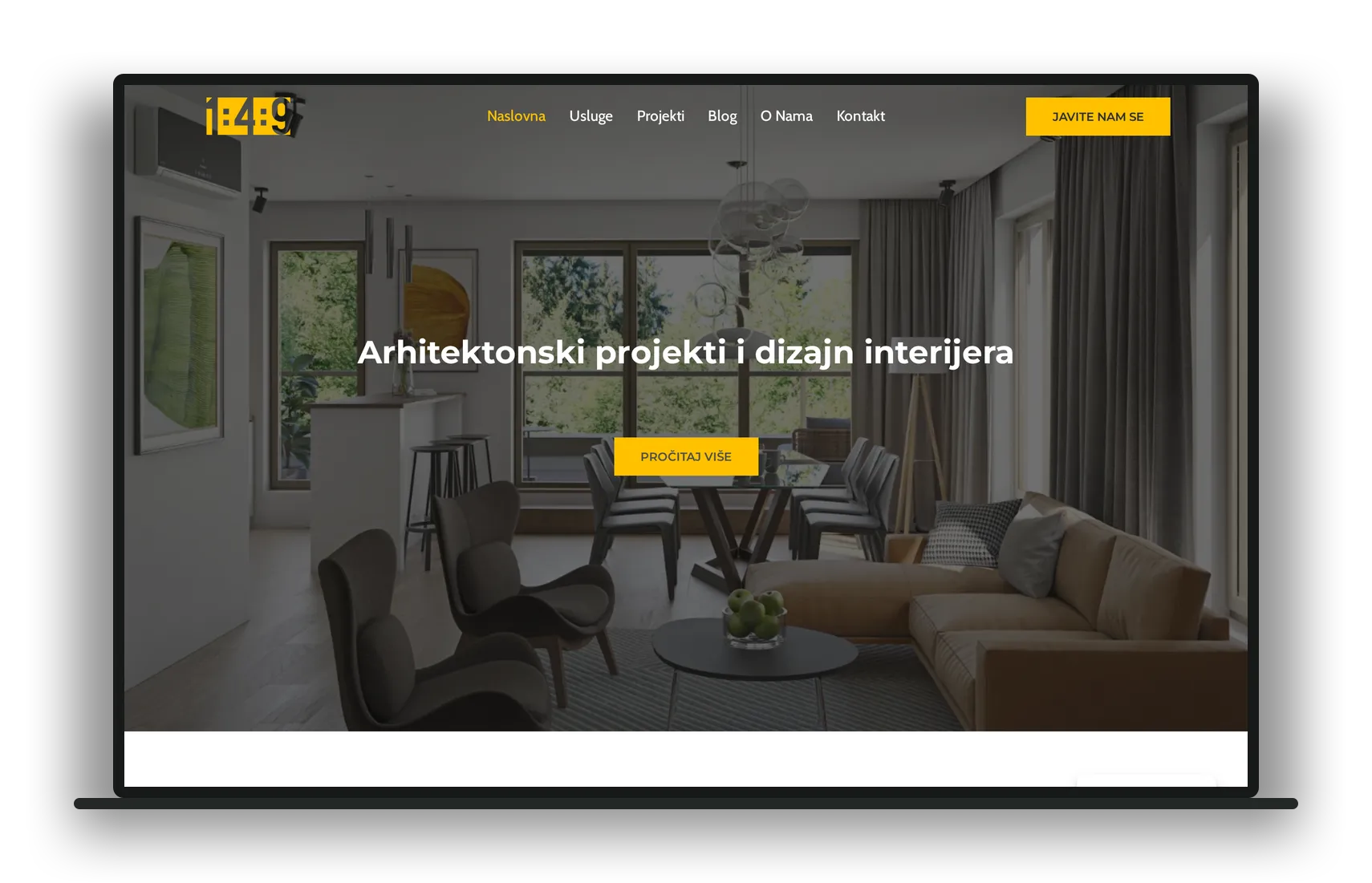 Naslovna stranica arhitektonskog ureda 1:4:9 prikazana na laptopu