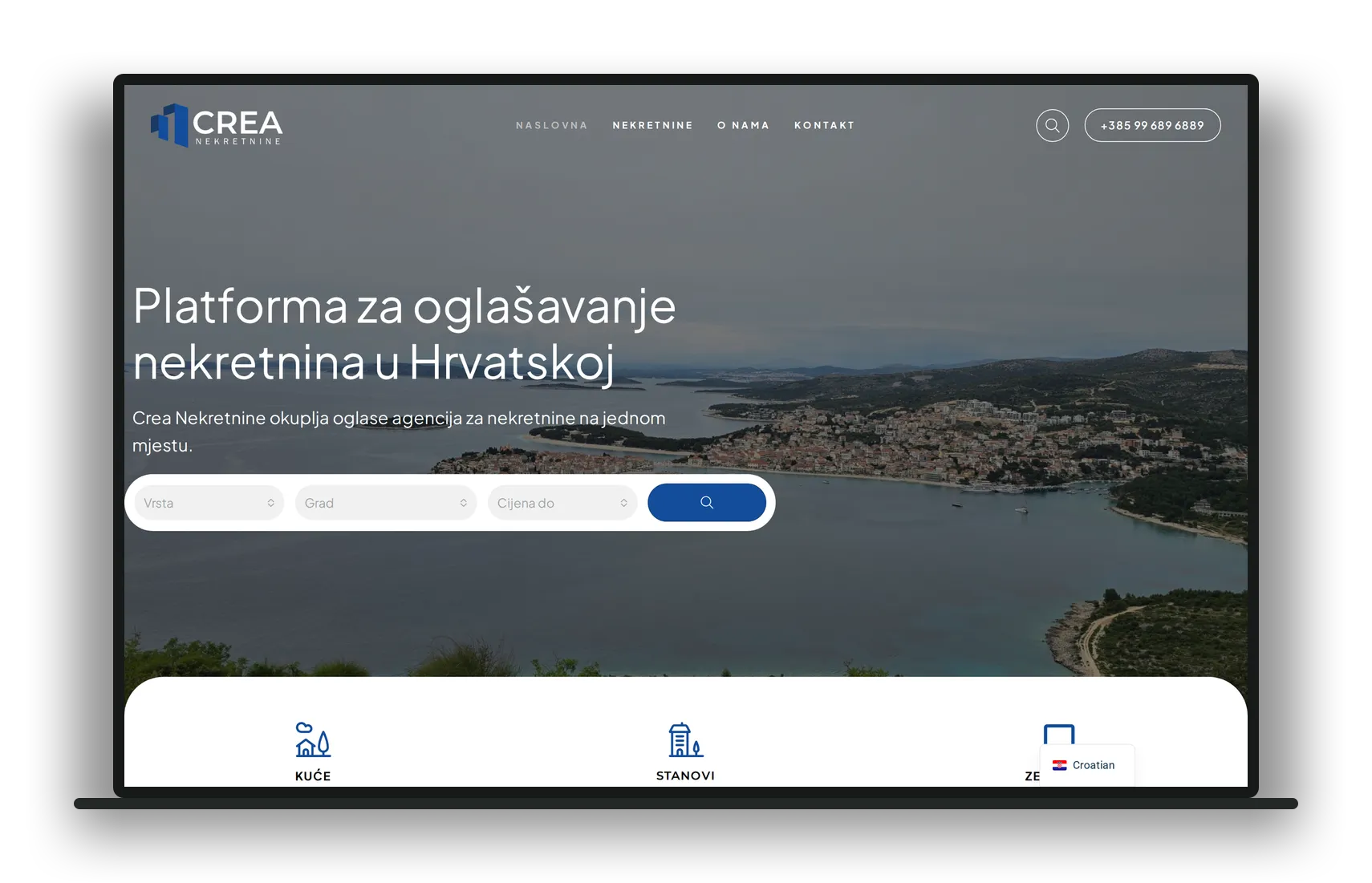 Naslovna stranica Crea Nekretnine prikazana na laptopu